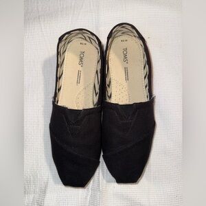 TOMS Black and Cream Slip-Ons Size 7.5